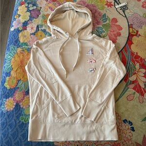 Cream Hoodie with Graphic Design